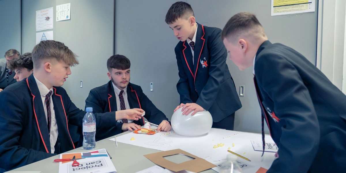 Male students working on influencer box project