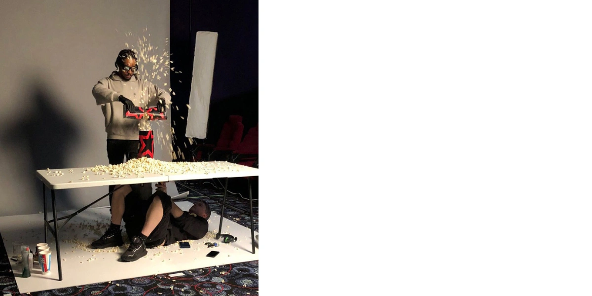 a leaf blower being used to move popcorn for recording
