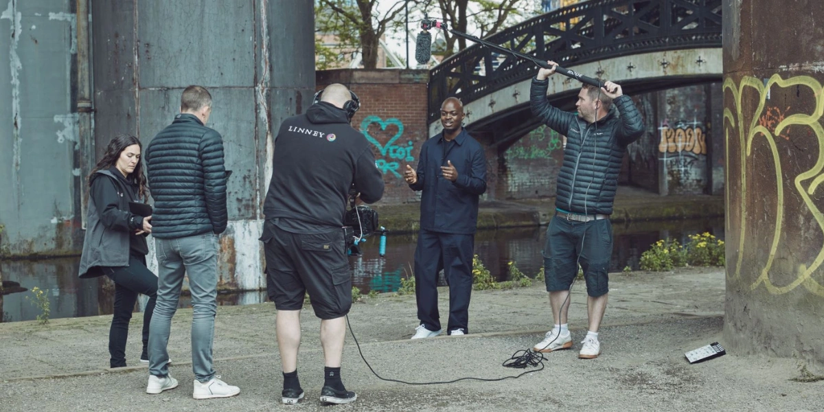 Film crew with a young poet