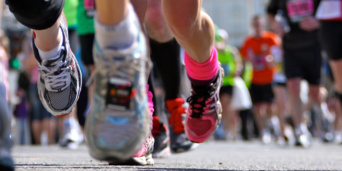 People running wearing trainers