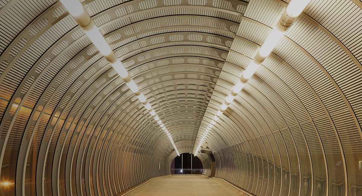 Tunnel with corrugated metal on the walls