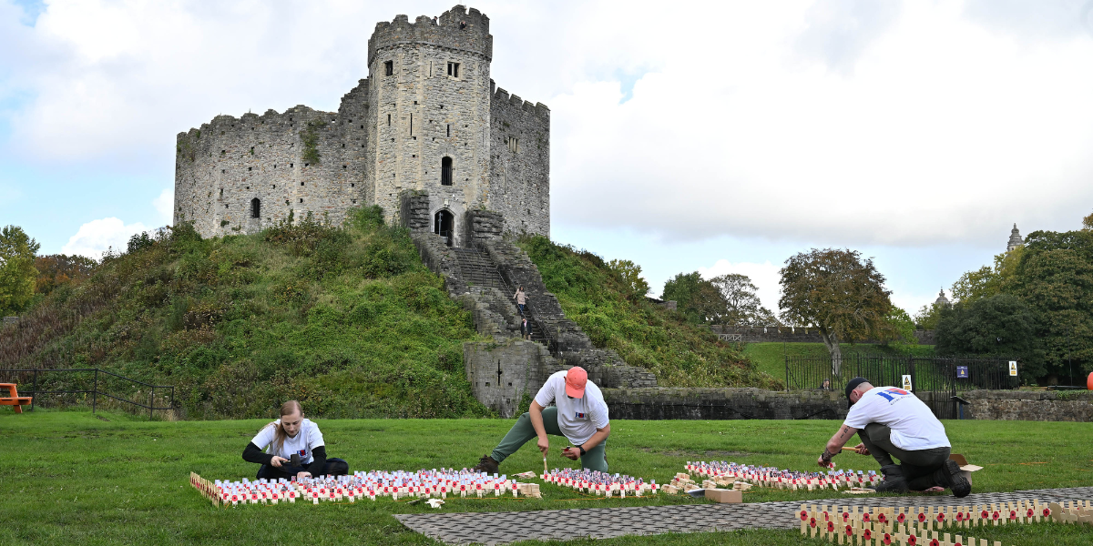 Remembrance Day Royal British Legion volunteers planting poppies at Cardiff Castle