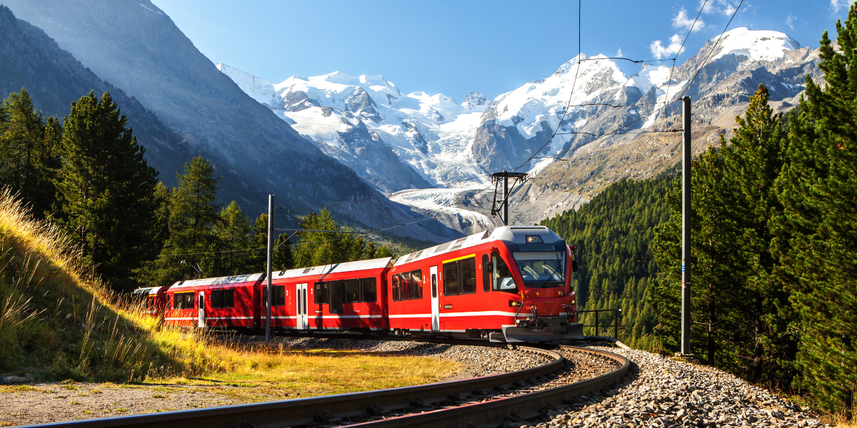 Train going through Swiss mountains