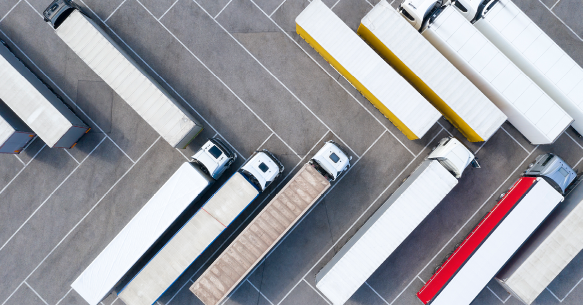 Lorries parked in an arrow shape