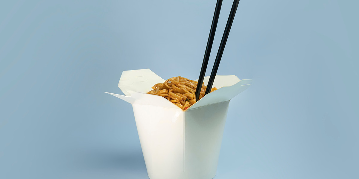 White box of noodles with blue background
